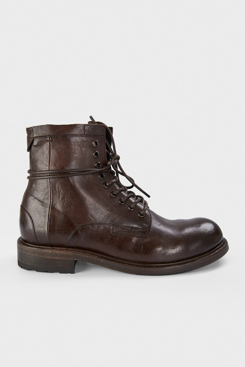 CURZON raw-timber military boots.