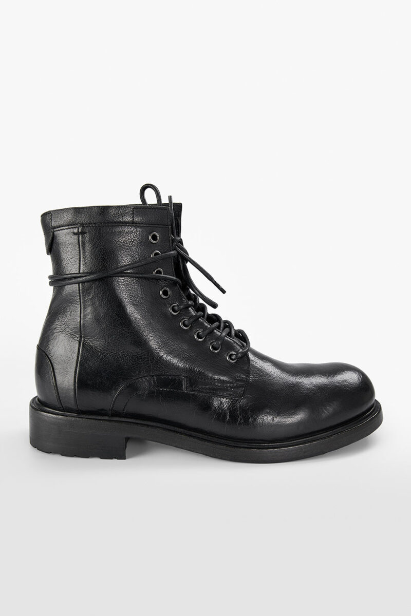 CURZON jet-black military boots.