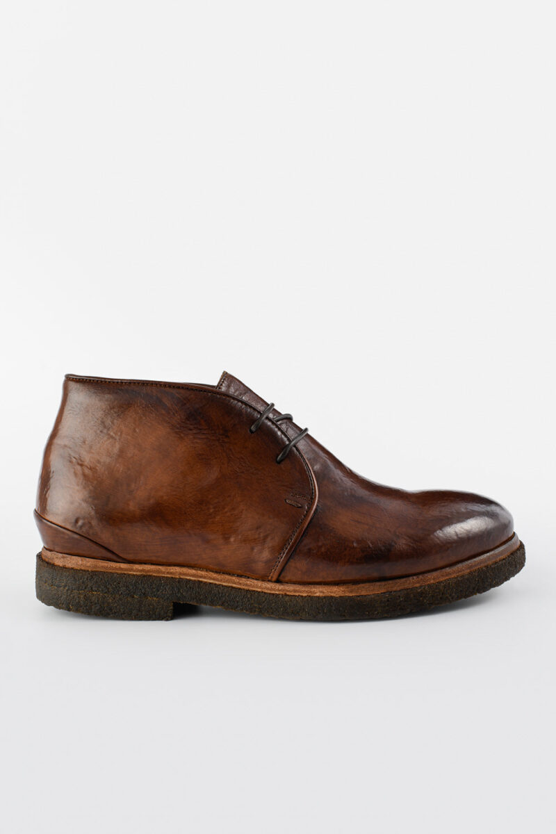 BROMPTON rich-brown chukka boots.