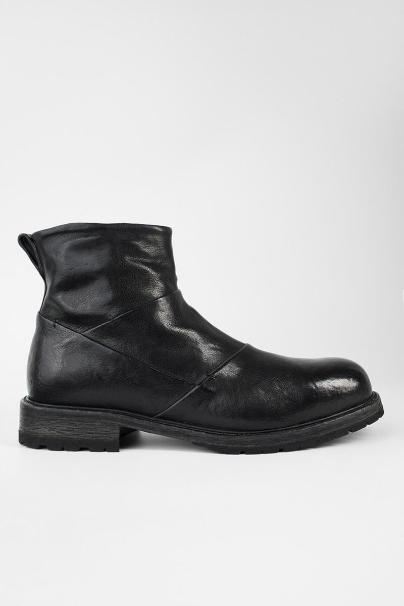 ROWLEY jet-black folded laceless boots.