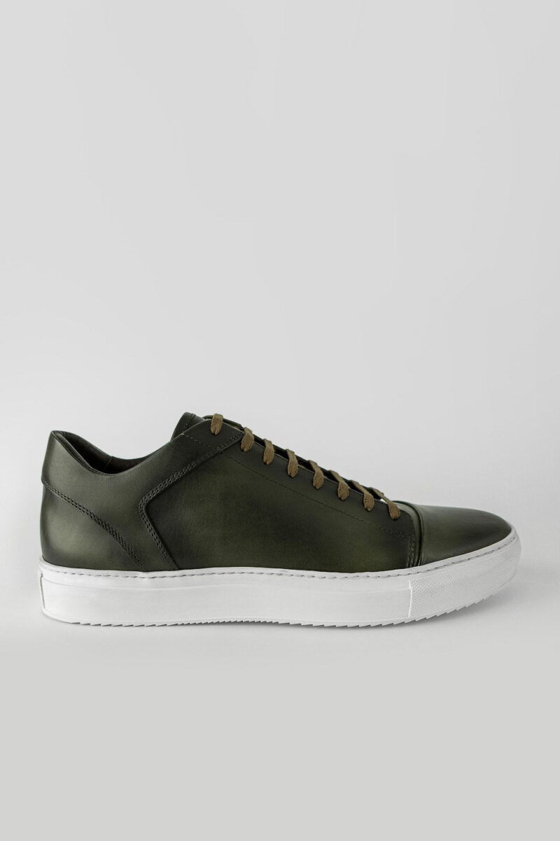 SOHO forest-green cap toe patina sneakers.